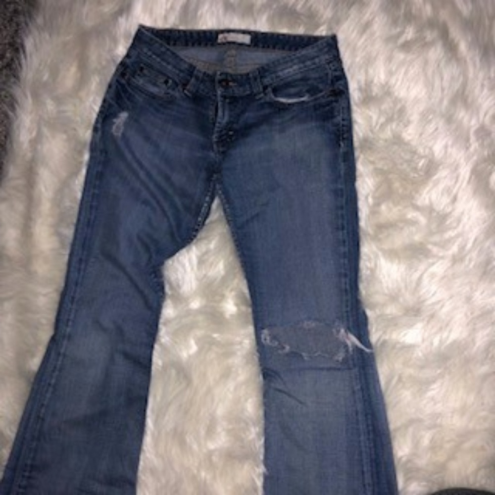 Buckle Distressed Denim Flare Jeans
